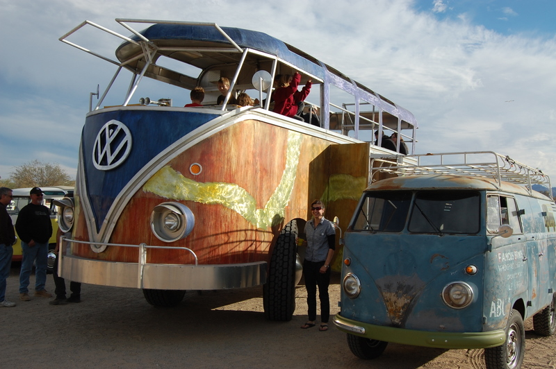 A GIANT VW bus that lights up and has a dance floor on the roof